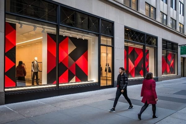 Storefront with bold red geometric window displays