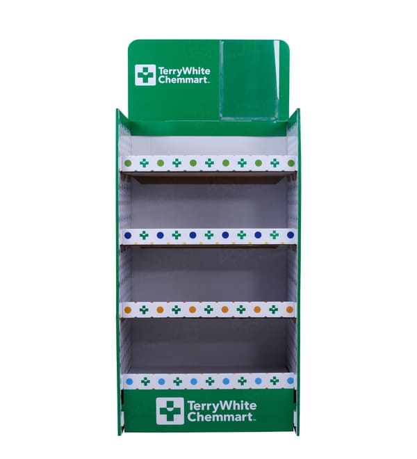 健康・美容製品を視認性の高い場所に配置するために設計された 4 段の段ボール棚ユニットの正面図。.