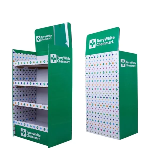 Seiten- und Rückansicht eines grünen Kartondisplays, bei dem das farbenfrohe Punkt- und Kreuzmuster auf den Innenwänden hervorgehoben ist.