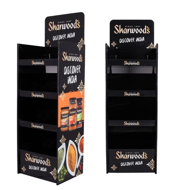 瓦楞纸零售落地展示架的侧视图和正视图，显示了香料和酱料的货架间距和品牌形象。.