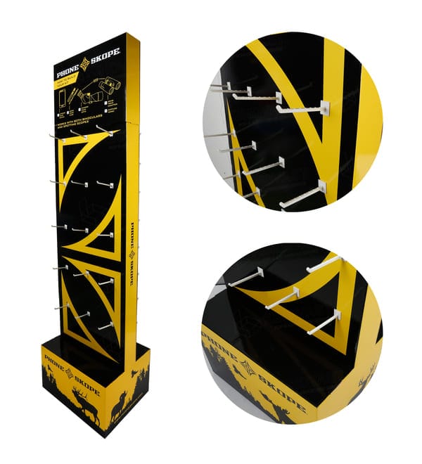 黑色和黄色瓦楞纸板展示架上的白色挂钩和高清图形的特写镜头。.