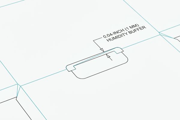 A technical drawing illustrates a 0.04-inch (1 mm) Humidity Buffer engineered into a receiving slot, preventing tearing in humid environments.