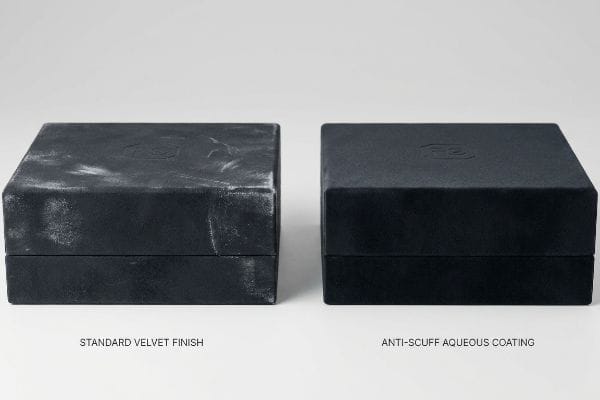 Scuffed dark velvet box labeled
