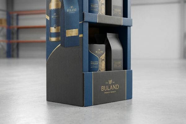 Retail display unit showcasing Buland Premium Quality products in dark blue and grey corrugated material with gold accents.