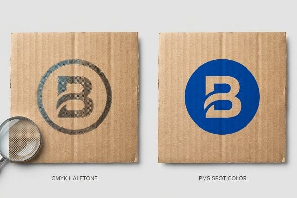 Corrugated cardboard displays a B logo, comparing CMYK Halftone's dot gain with PMS Spot Color's dense ink on unsealed kraft board.