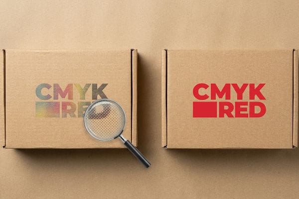 Corrugated boxes display Cmyk Red halftone dots magnified, contrasting with vibrant spot color printing for clarity.