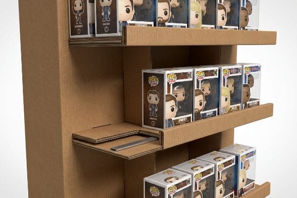 Corrugated cardboard display with Funko Pop figures on reinforced shelves, featuring a hidden metal support bar for structural integrity.