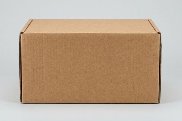 Brown corrugated cardboard shipping box made from durable kraft board, ideal for retail packaging and transit.