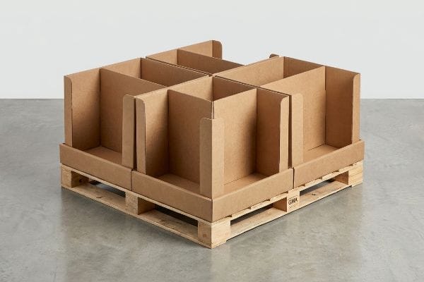 Brown corrugated cardboard display unit with eight compartments on a standard GMA wooden pallet.