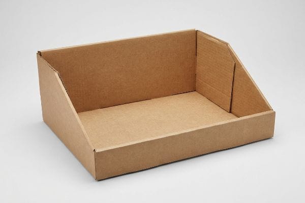 An empty brown corrugated cardboard PDQ display tray for retail, showcasing its rigid structure.