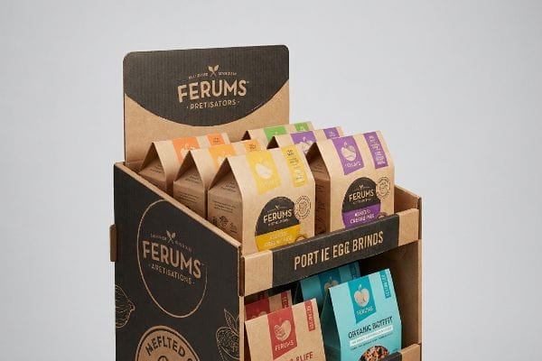 A multi-tiered cardboard FSDU showcasing Ferums Pretistors products in colorful pouches, including Portie Egg Brinds and Organic Betfit.