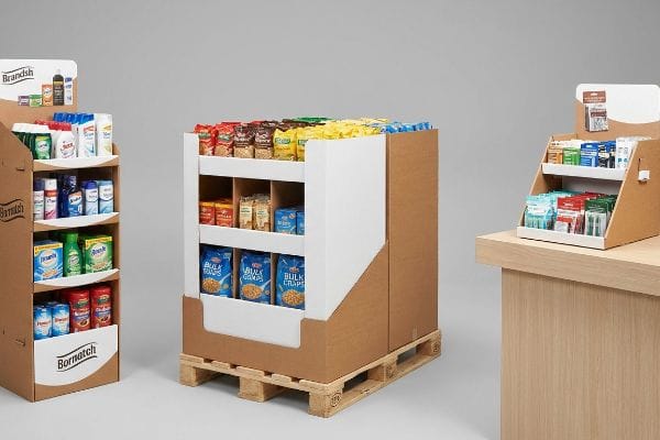 Corrugated cardboard floor stand, pallet merchandiser, and countertop unit displaying Brandish, Bornwatch, and Bulk Goods products on a wooden pallet.