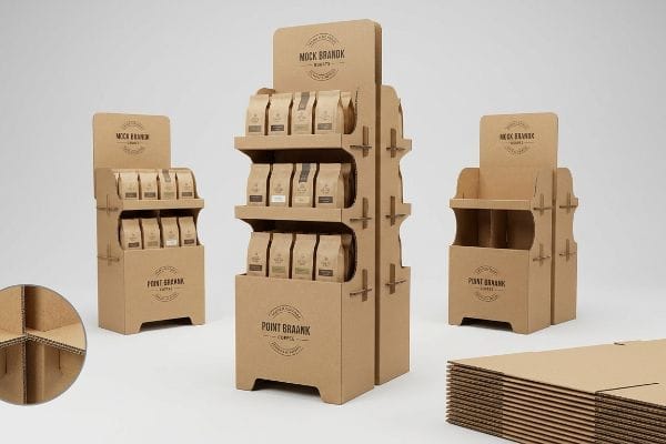 Corrugated cardboard point of purchase displays, stocked with Mock Brandk coffee bags, one empty, highlighting interlocking tabs.