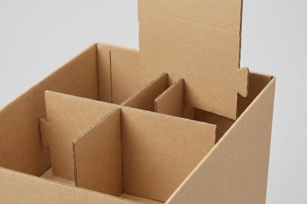 Brown corrugated cardboard box with interlocking modular dividers, forming adjustable compartments for retail display flexibility.