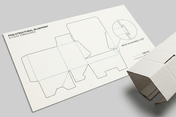 PDQ Structural Blueprint for B-Flute Corrugated packaging, showing bend allowance of 0.125 inches and a partially folded box.