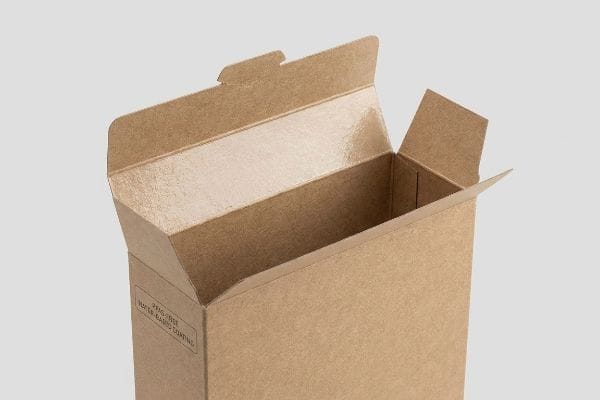 Kraft cardboard box with an open lid, revealing a glossy interior and 'PFAS-Free Water-Based Coating' printed vertically on its side.