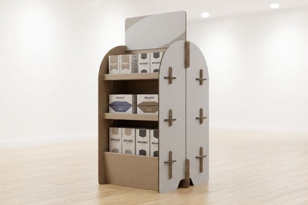 A corrugated cardboard POP display with three-tier shelves holds product boxes labeled 