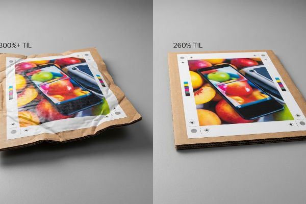Warped corrugated board from 300%+ TIL print vs. flat board with 260% TIL, showing ink limit's effect on structural integrity.