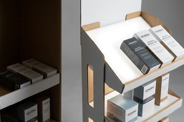 White litho-laminated cardboard display with 15-degree angled shelves showcasing Generic Prietic Brandish cosmetic boxes, enhancing product visibility.
