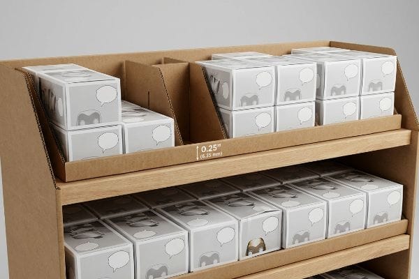 Corrugated cardboard display with light gray collectible boxes, featuring 0.25-inch (6.35 mm) asymmetrical modular clearance for Funko POPs.