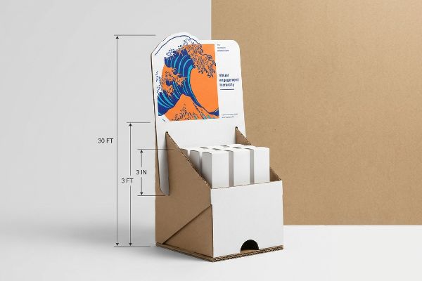 Die-cut cardboard retail display with wave header, showing 'Vibrant Engagement Hierarchy' and 3-3-3 spatial rule: 30 FT, 3 FT, 3 IN.