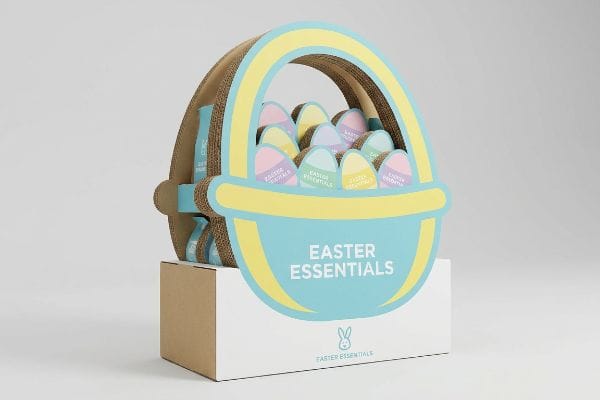 Corrugated cardboard Easter basket display features pastel eggs, each labeled 