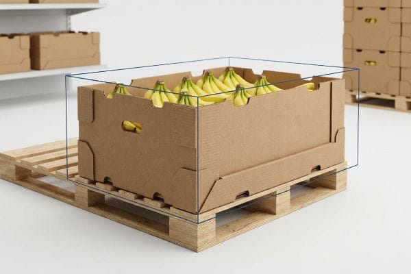 Brown corrugated master carton of ripe bananas on a wooden pallet, illustrating a zero-overhang bounding box for shipping.
