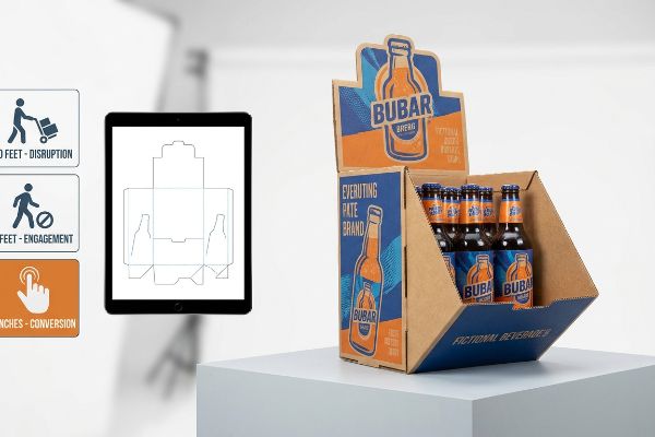 Corrugated Bubar beer POP display with die-cut header, shown with a tablet displaying a dieline and the 3-3-3 Spatial Engagement Rule for retail.