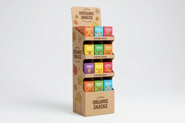 Showcasing Canary's Organic Snacks, a multi-tiered corrugated kraft paper floor display holds colorful organic snack boxes for retail merchandising.
