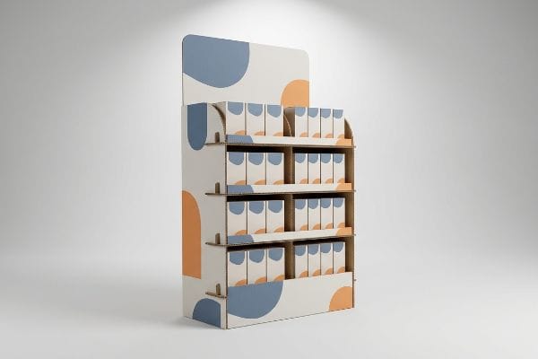 Cardboard POP Display Boxes A studio shot features a cardboard point of purchase display with abstract blue and orange shapes, filled with white product boxes.