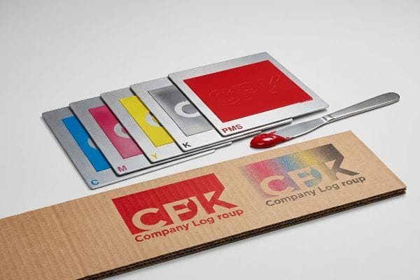 Metal printing plates for C, M, Y, K, and Pms spot color, with red Pantone ink and corrugated board showing solid red and CMYK halftone logos.