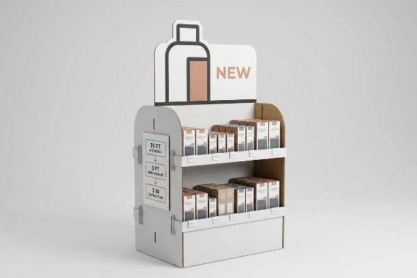 Corrugated POP display with "New" products, highlighting "30 Ft Attention", "3 Ft Engagement", "3 In Extraction" on its side.