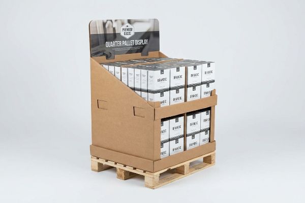 Brown corrugated quarter pallet display for Premium Foods, on a wooden pallet, filled with Brandic product boxes.