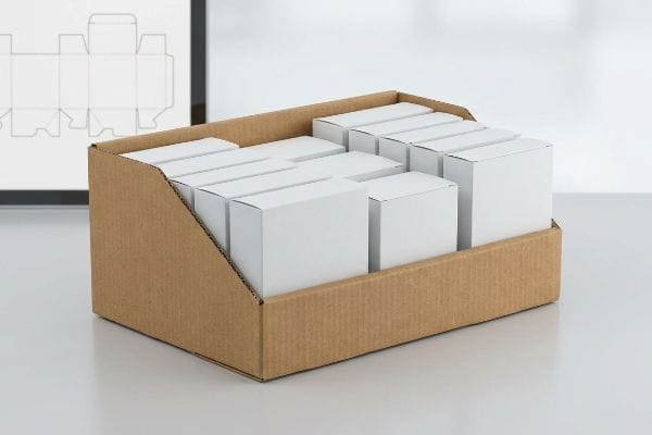 Brown corrugated PDQ display unit filled with white product boxes, beside a box dieline template.
