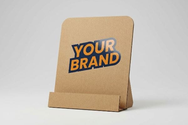 A retail point-of-purchase display, crafted from brown corrugated cardboard with rounded corners, showcases a vibrant printed brand logo.