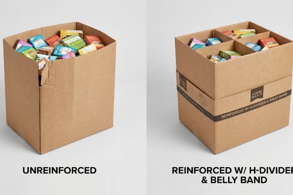 Unreinforced cardboard dump bin with side bulge next to a Reinforced With H-Divider & Belly Band bin, filled with products.
