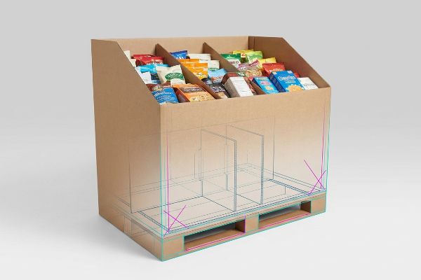 This cardboard retail dump bin displays packaged snacks, revealing its internal structural design, dividers, and pallet base.