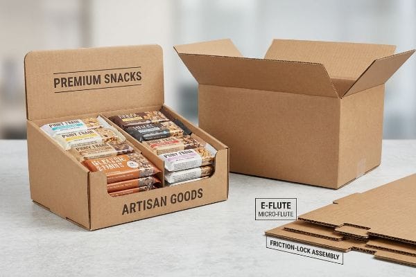 E-Flute Counter Display Brown E-flute micro-flute corrugated counter display unit, labeled Premium Snacks and Artisan Goods, with friction-lock assembly components.