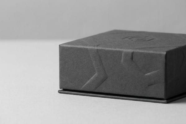 embossed geometric paperboard box