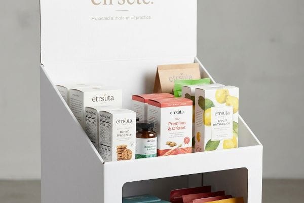 Etrsuta Retail Display White corrugated display with Etrsuta health supplements: Premium & Oftat, Apple's Botanic Oil, Humer White Rice.