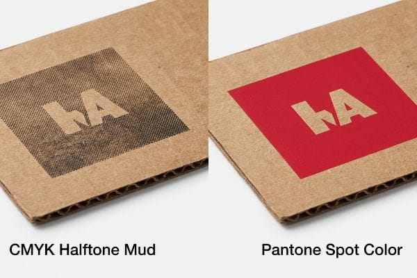 Corrugated cardboard shows a grainy CMYK Halftone Mud 'hA' logo next to a vibrant Pantone Spot Color 'hA' logo, highlighting print quality difference.