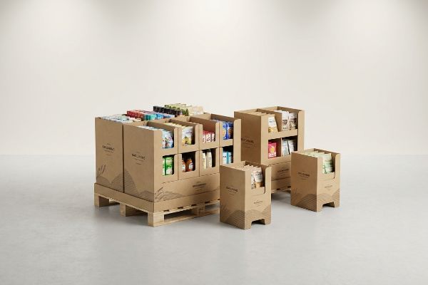 Kraft cardboard retail displays, featuring a large pallet, a half, and multiple quarter pallet displays filled with products. 