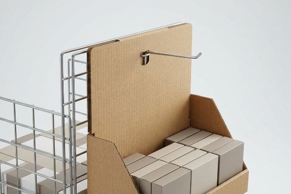 Corrugated power wing sidekick display featuring a metal S-clip on a reinforced header, holding stacked boxes on a wire rack.