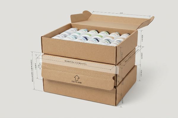 Brown corrugated retail-ready packaging with modular 12.00-inch width and compliance dimensions.