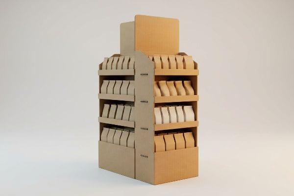 This natural corrugated cardboard end cap display features multi-tiered shelves filled with plain brown paper bags, ideal for grocery store retail fixtures.