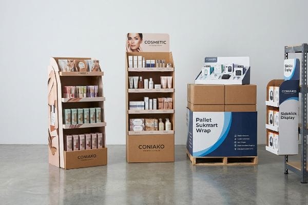 Corrugate POP Displays Various point-of-purchase corrugate displays, featuring Coniako Cosmetic floor merchandisers, a pallet Sukrrart wrap, and a sidekick display.