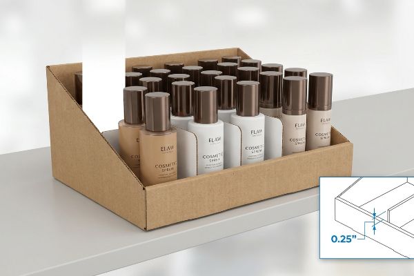 Brown corrugated cardboard PDQ display with Elaw Cosmetic Serum bottles, highlighting 0.25-inch internal clearance for restocking.