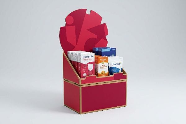 Présentoir PLV en carton rouge, en-tête découpé sur mesure, contenant les produits Henormix, Pacelia Deox Reactivator et Channor.