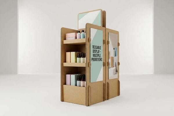 A multi-tiered corrugated cardboard floor stand display holds cosmetic products, with a side panel stating 'Reusable Display - Multiple Promotions'.