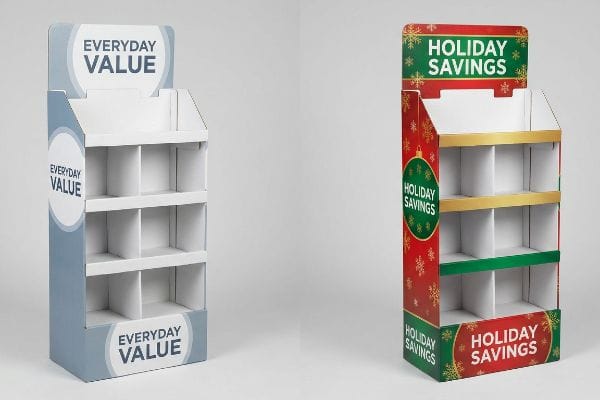 Two empty corrugated retail display stands, one blue 'Everyday Value' and one red 'Holiday Savings' with snowflakes, showcasing seasonal graphic customization.